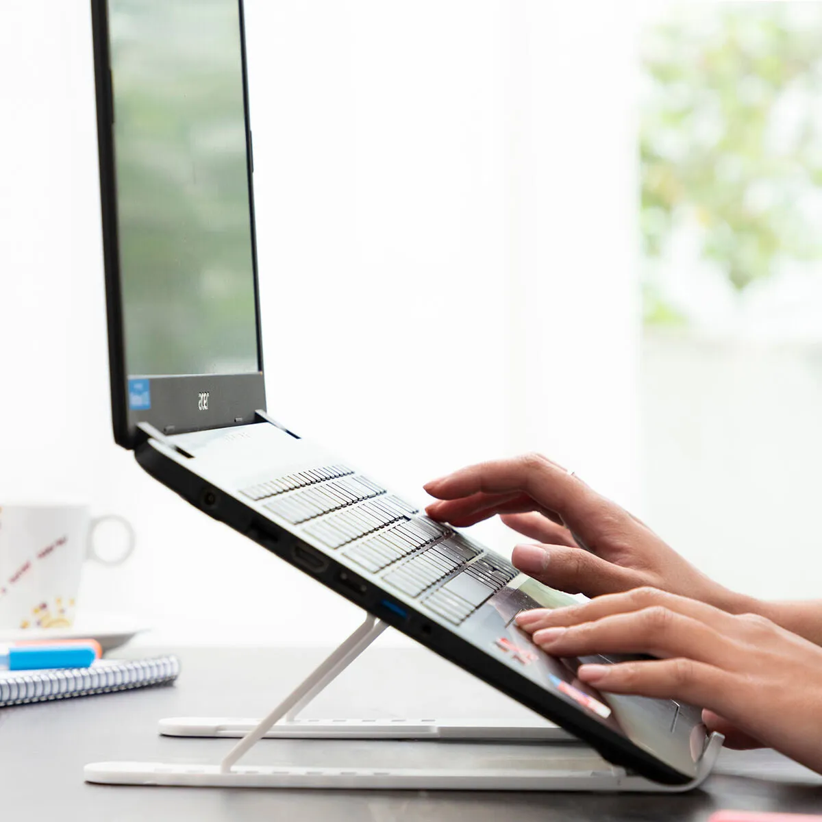 Folding and Adjustable Laptop Stand